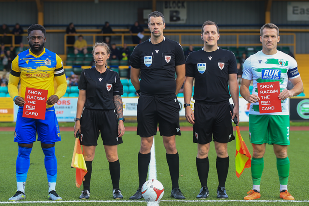 Captains and officials line-up before kick-off